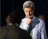 Democratic Presidential hopeful Sen. John Kerry, D-Mass. listens closely to an unidentified rally attendee during the question and answer session of the program at Tougaloo College, Sunday, March 7, 2004 in Tougaloo. Miss. (AP Photo/Charles Smith)